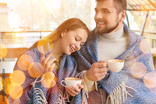 Young couple drinking coffe...