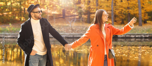 Happy young couple holding ...