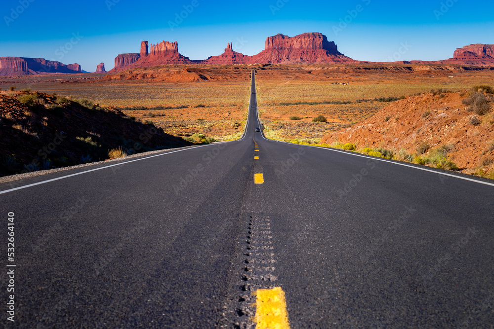 Highway Road U.S. Highway 163 and Monument Valley at sunset, Arizona, USA