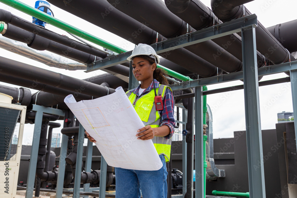 Engineer under industrial inspection Large water heaters are used in high-rise condominiums.
Engineer under industrial inspection Large water heaters are used in high-rise condominiums.