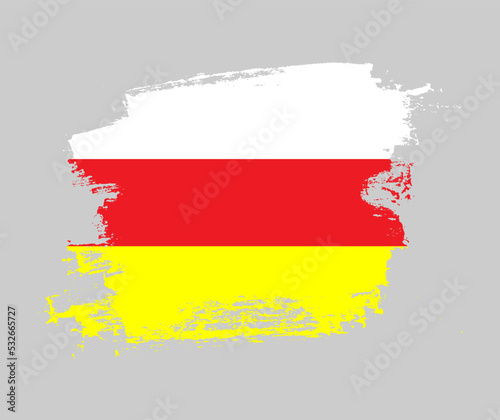 Artistic North Ossetia national flag design on painted brush concept