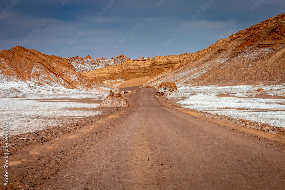 Dirt road in Atacama desert, moon valley landscape in Chile, South America