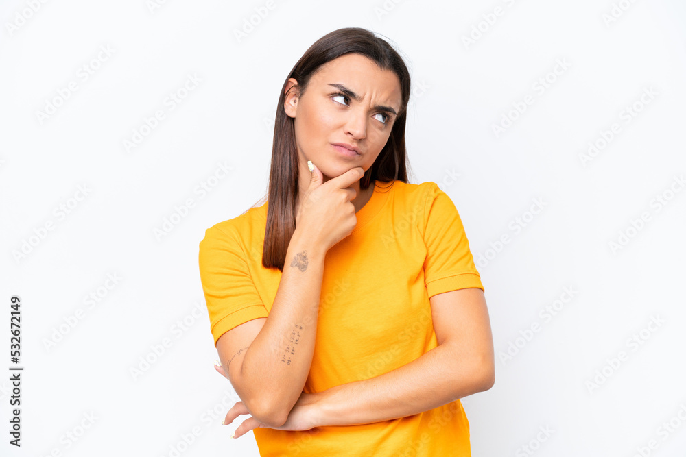 Young caucasian woman isolated on white background having doubts Young caucasian woman isolated on white background having doubts