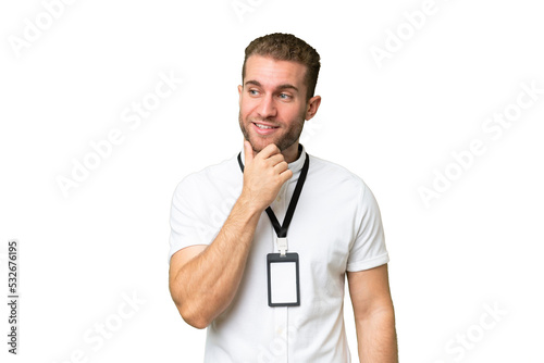 Young handsome blonde man over isolated background