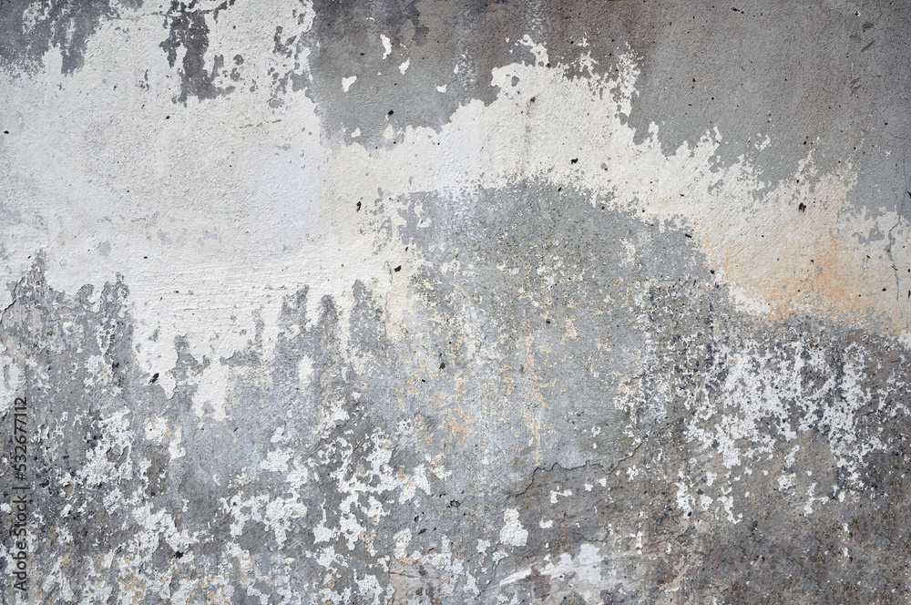 Obraz premium Empty old plastered wall texture. Painted problematic wall surface. Dilapidated building facade with damaged plaster.