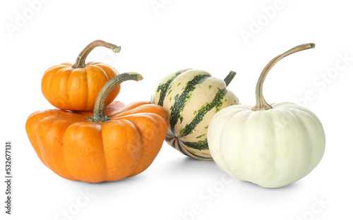 Heap of different Halloween pumpkins on white background
