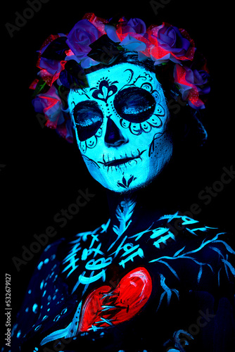 UV body art painting of helloween female skeleton
