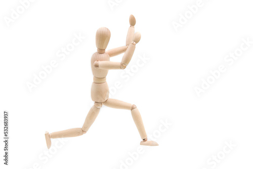 Wooden dummy man running away on isolated white background