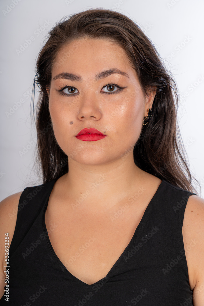 Woman posing on isolated white background, selective focus shot. Woman posing on isolated white background, selective focus shot.