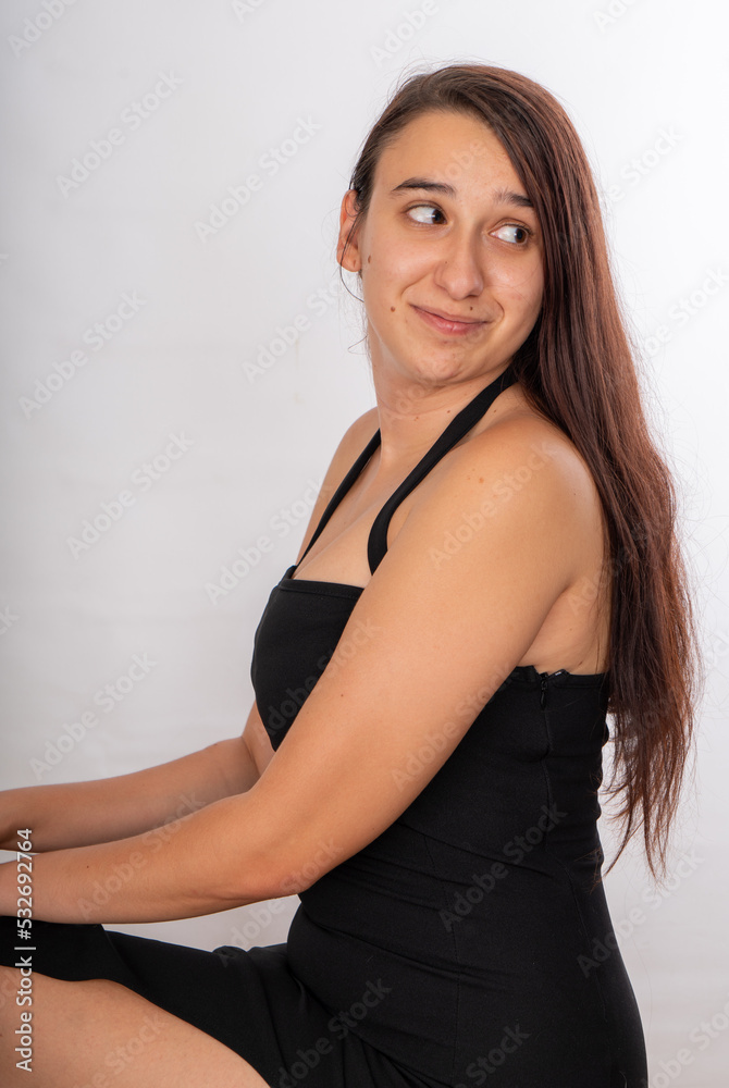 Woman posing on isolated white background, selective focus shot. Woman posing on isolated white background, selective focus shot.