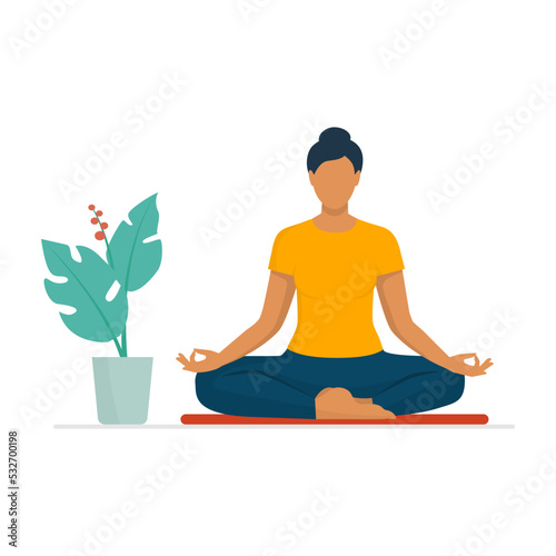 Woman practicing yoga and meditation
