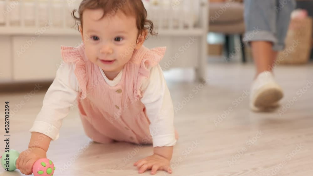Happy baby, play and toys for learning, mobility and child development with girl building educational toy blocks on floor at home. Infant kid feeling curious and playful while on a blanket in nursery Happy baby, play and toys for learning, mobility and child development with girl building educational toy blocks on floor at home. Infant kid feeling curious and playful while on a blanket in nursery
