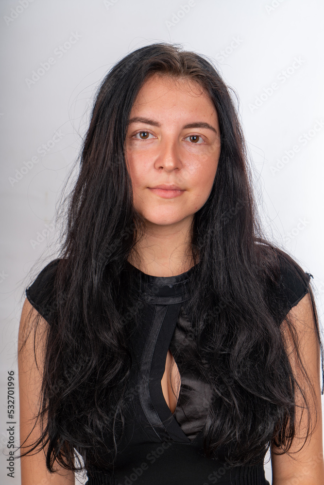 Fototapeta premium Woman posing on isolated white background, selective focus shot.
