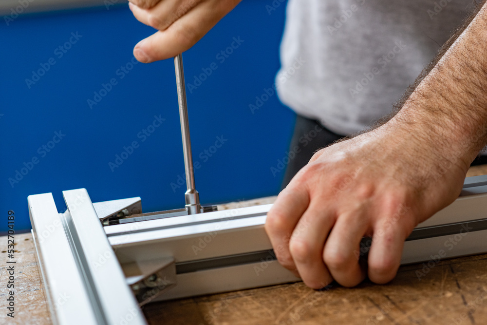 close up of a person using a saw close up of a person using a saw