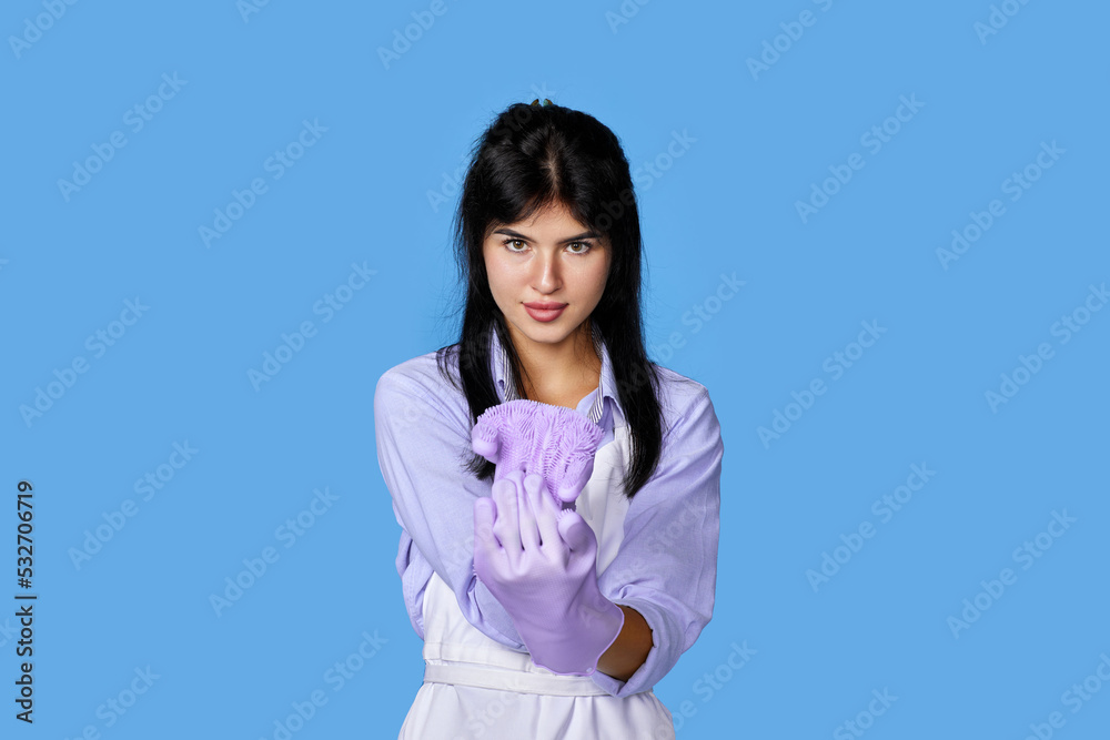 woman in gloves and cleaner apron showing ok sign woman in gloves and cleaner apron showing ok sign