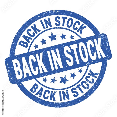 BACK IN STOCK text written on blue round stamp sign.