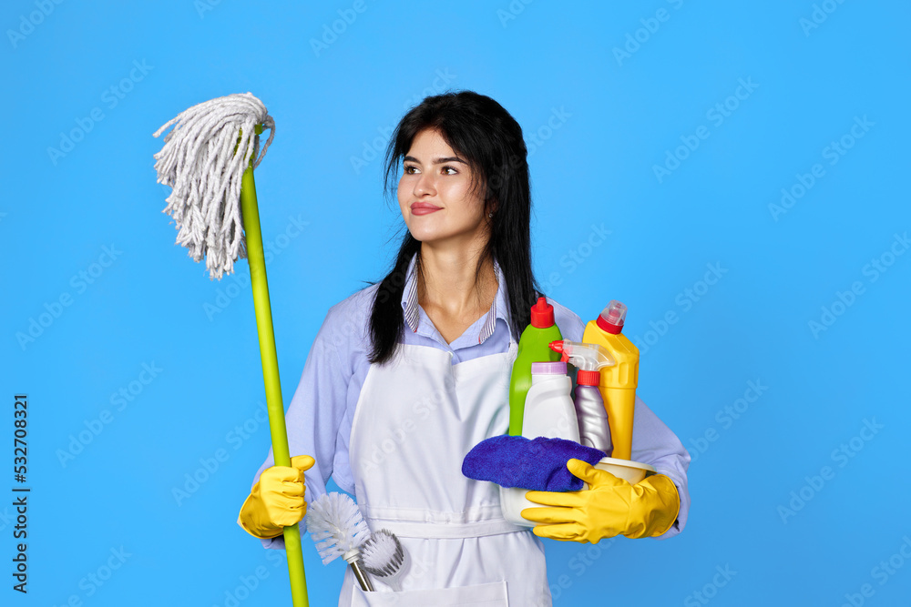 woman in gloves holding bucket of detergents and mop woman in gloves holding bucket of detergents and mop