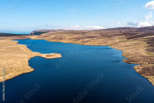 aerial view of reservoir in the countryside of Northern Ireland during Springtime