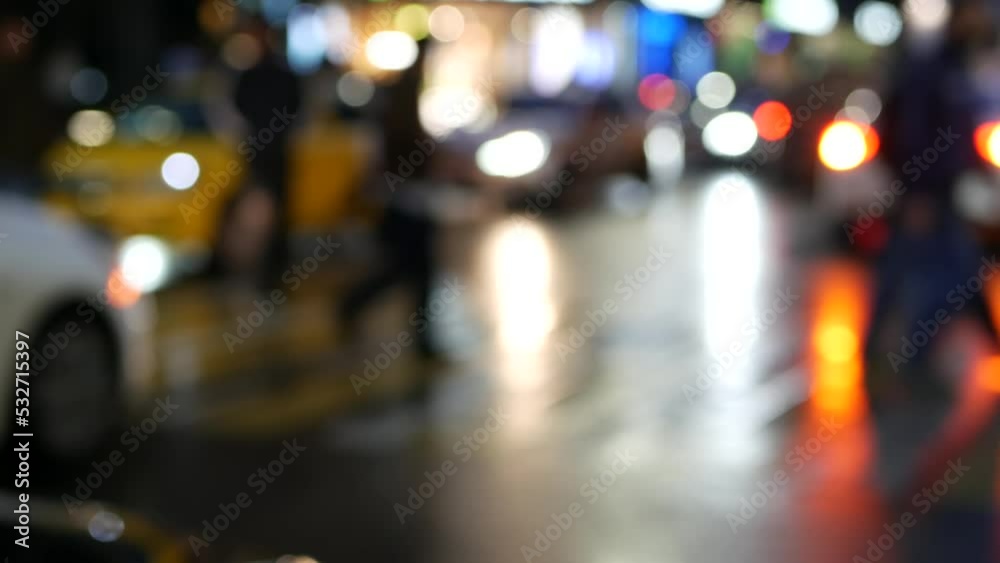 Defocused pedestrians walking on zebra in twilight, people crossing road on crosswalk, crowd on megapolis street in evening dusk. Big city life, urban downtown. Moscow looks like New York. Ped xing. Defocused pedestrians walking on zebra in twilight, people crossing road on crosswalk, crowd on megapolis street in evening dusk. Big city life, urban downtown. Moscow looks like New York. Ped xing.