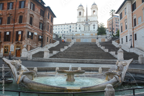 The Fontana della Barcaccia is a fountain in Rome, located in Piazza di Spagna, at the foot of the Spanish Steps. photo