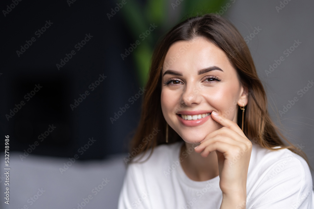 Beauty woman looking at camera at home Beauty woman looking at camera at home