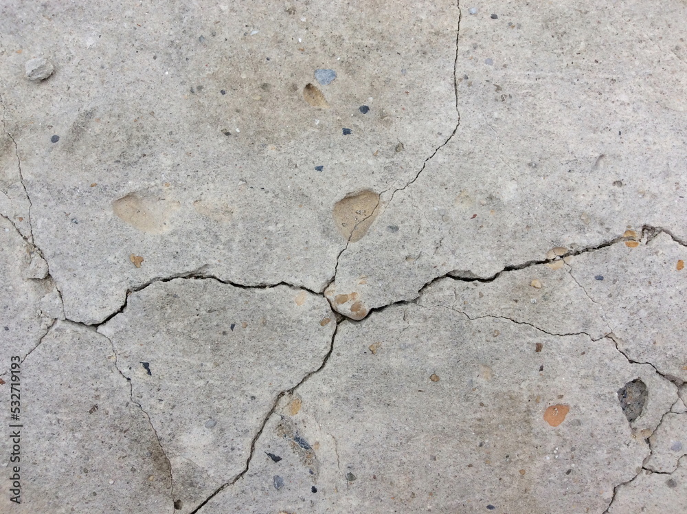 Obraz premium Cracked concrete texture closeup background.