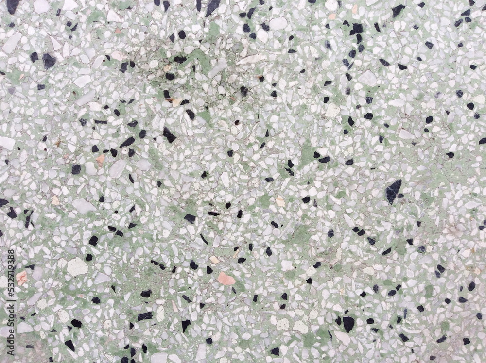 rough texture surface of exposed aggregate finish, Ground stone washed floor, made of small sand stone in light brown color