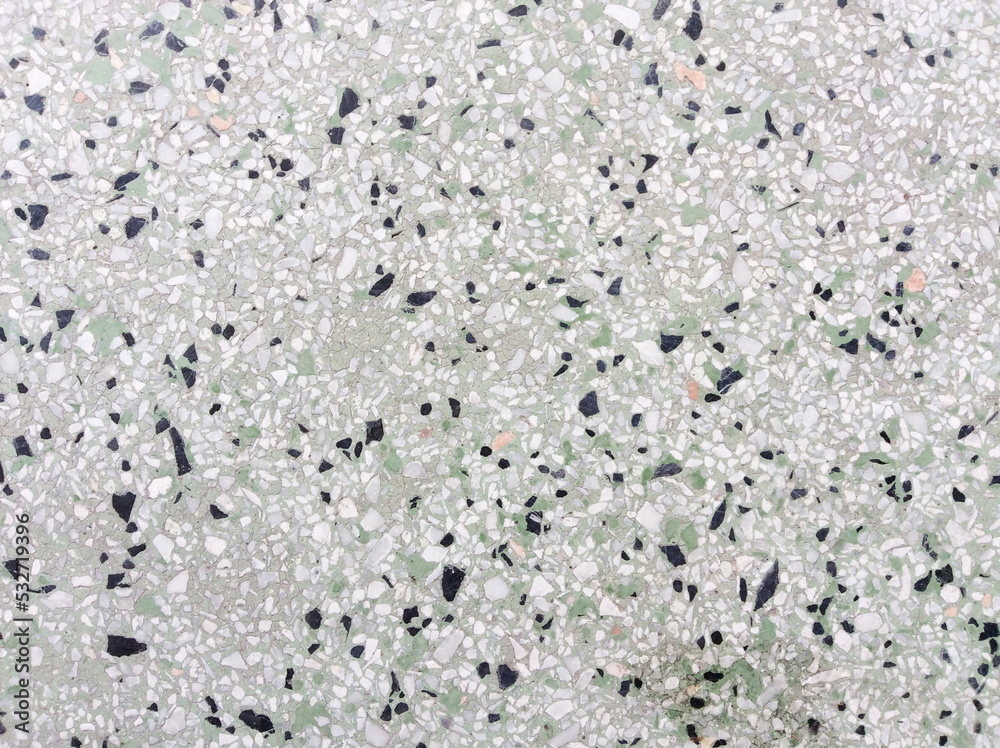 rough texture surface of exposed aggregate finish, Ground stone washed floor, made of small sand stone in light brown color