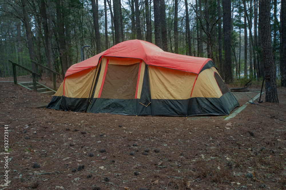 Tent set up in a forest Tent set up in a forest