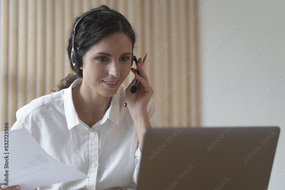 Young italian woman call center agent in headset talking with client, consulting customer online Young italian woman call center agent in headset talking with client, consulting customer online