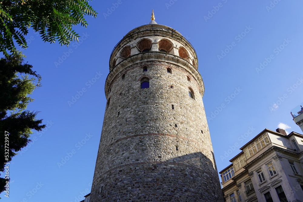Istanbul, Turkey - Agust 08, 2022: The famous Galata tower in Istanbul, Turkey. This is a popular tourist attraction in the city. 