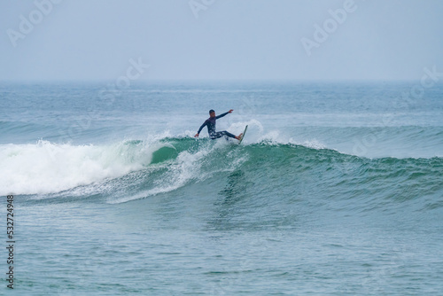 Brazilian surfer in action © homydesign