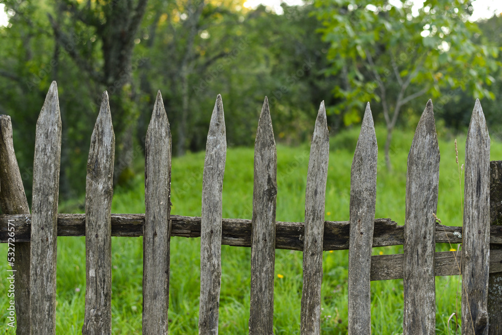 Old wooden fence typical for rural area