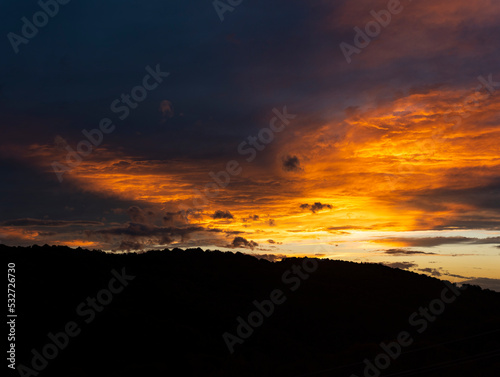 Beautiful sky and clouds during sunset over a mountain © rastkobelic