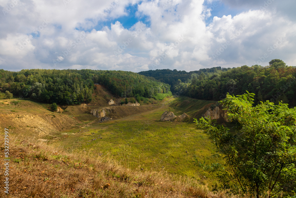 A former marl quarry in the south of Limburg near the city of Maastricht, which is converted in to a unique area for outdoor activities and with typical characteristic biodiversity for marl areas. 