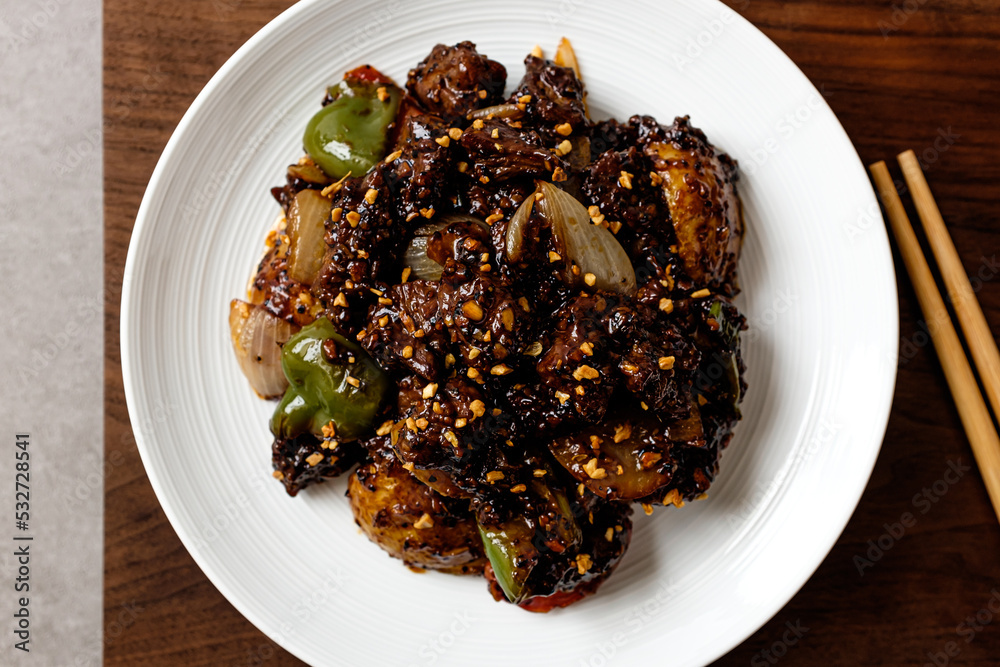 Stir-fried Chinese style beef in spicy and stimulating taste