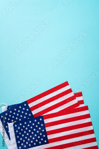 United States election design concept, American Flag over blue table background.