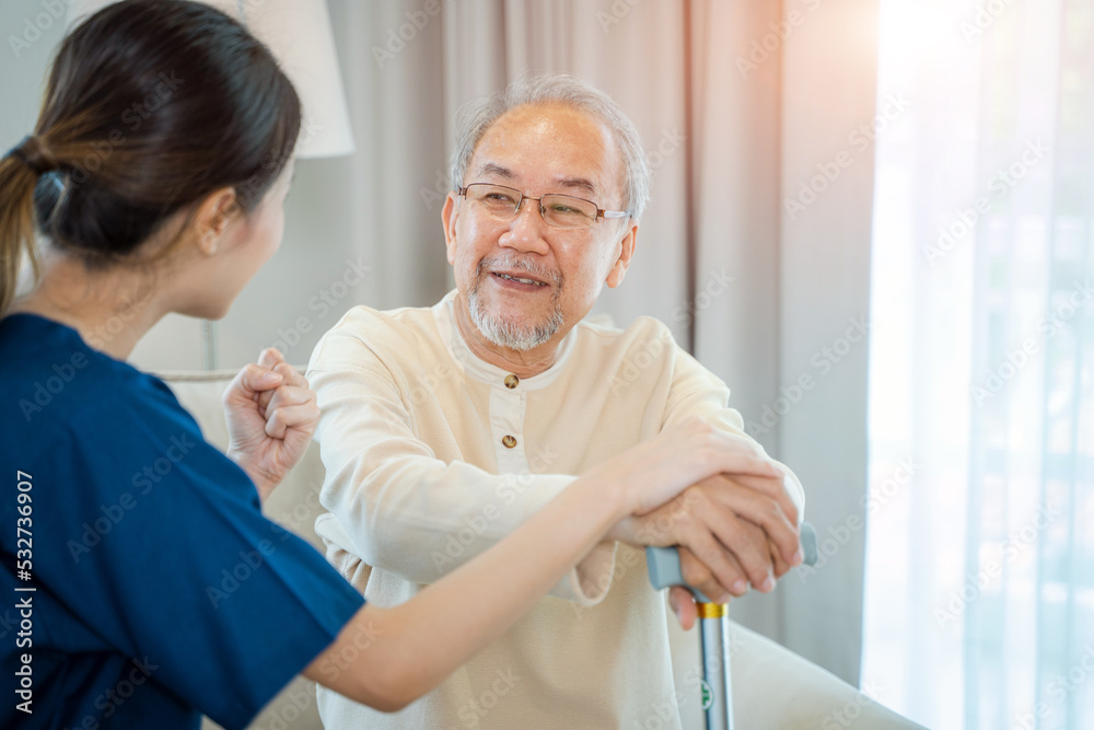 Obraz premium Caregiver talking to senior man in bedroom,Medical help trust support encourage reassure patient,Home care service.