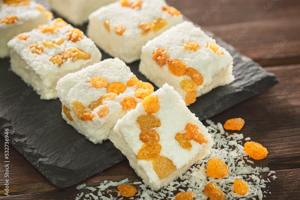 Arabic traditional coconut candies with raisins. Egyptian oriental desserts usually eaten during Arabic traditional coconut candies with raisins. Egyptian oriental desserts usually eaten during