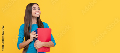 happy teen girl wuth school notebook for making notes, homework. Banner of school girl student. Schoolgirl pupil portrait with copy space.
