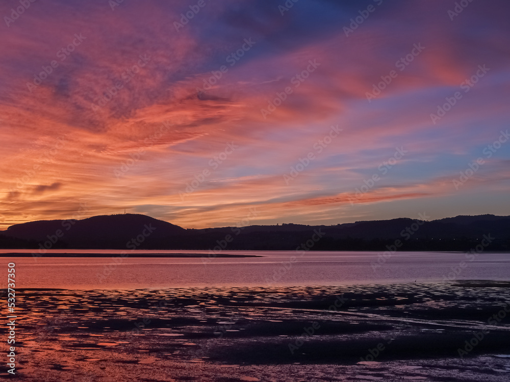 Dramatic deep colours of brilliant sunrise