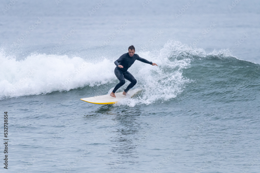 Surfer in action on the ocean waves