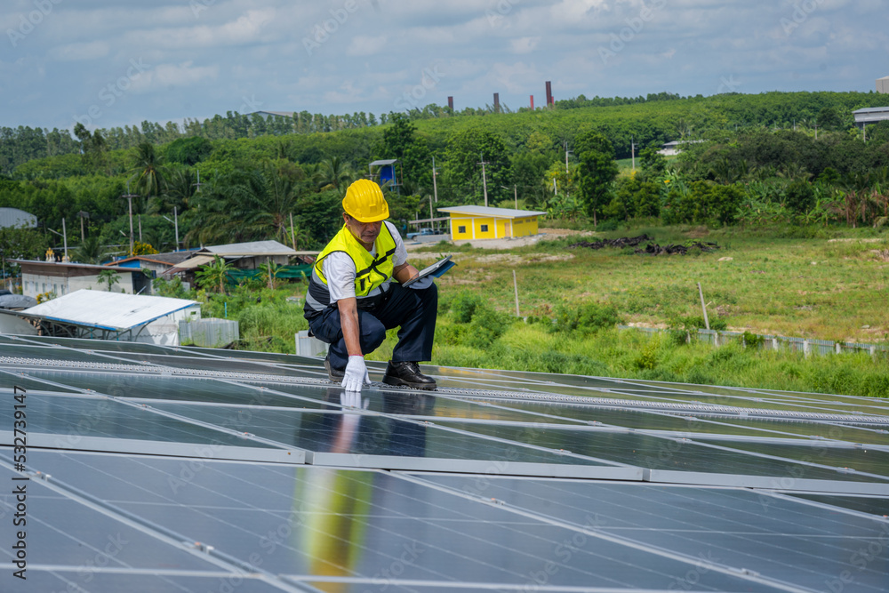 custom made wallpaper toronto digitalEngineer wearing safety harness belt during working on replacement solar panel in solar power plant,Ecological.