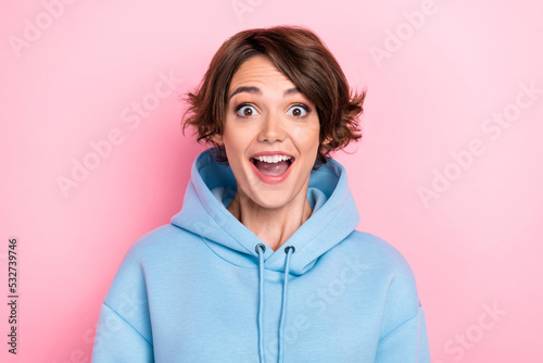 Photo of cute astonished girlfriend impressed good news information rejoice cool offer stylish clothes isolated on pink color background © deagreez