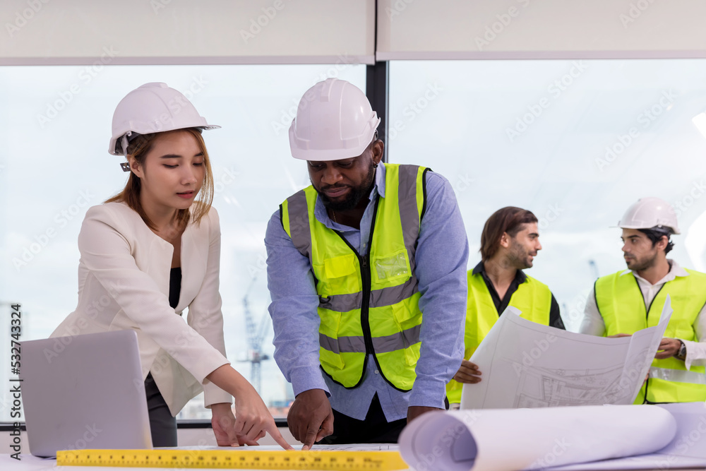 Team Engineers with draft plan of building on constructing site. Engineer work on site. engineer visit and inspection site engineer. Inspector engineer check and working on site. Team Engineers with draft plan of building on constructing site. Engineer work on site. engineer visit and inspection site engineer. Inspector engineer check and working on site.