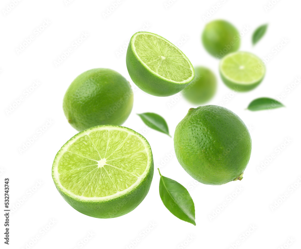 Fresh Green lime with cut in half and leaves levitate isolated on white background.