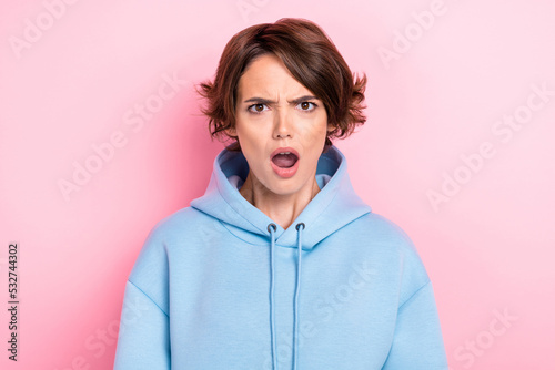 Photo of young adorable pretty cute nice gorgeous woman wear blue sweater open mouth unhappy speechless funny reaction isolated on pink color background © deagreez