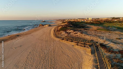 Beautiful empty beach evening in Portugal photo