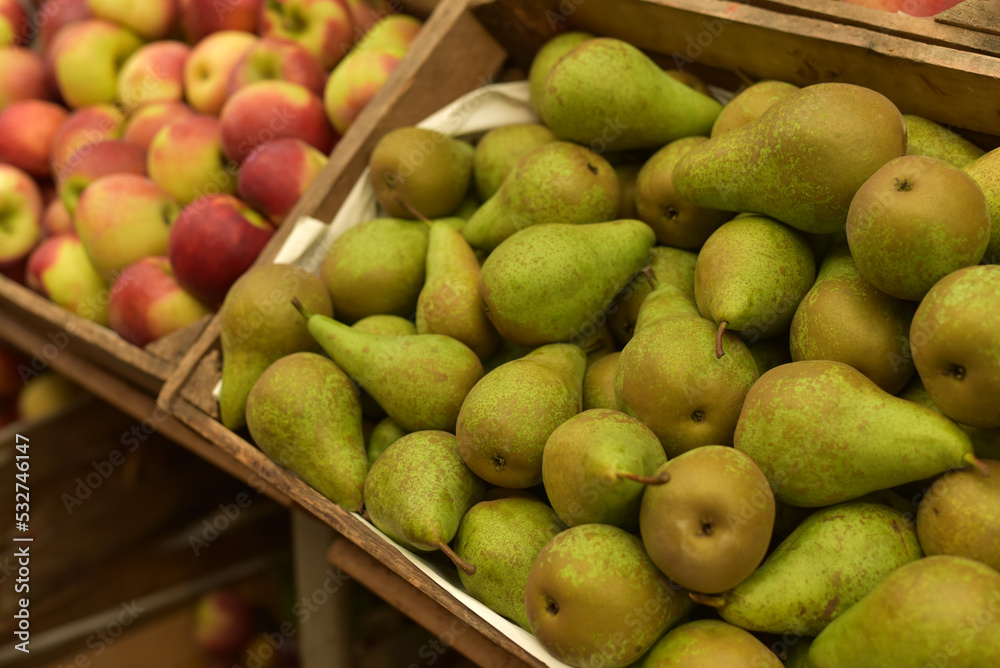 Pears and apples on the market
