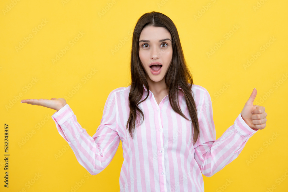 Portrait of young woman pointing hand, having great innovative idea, thumbs up. Portrait of young woman pointing hand, having great innovative idea, thumbs up.